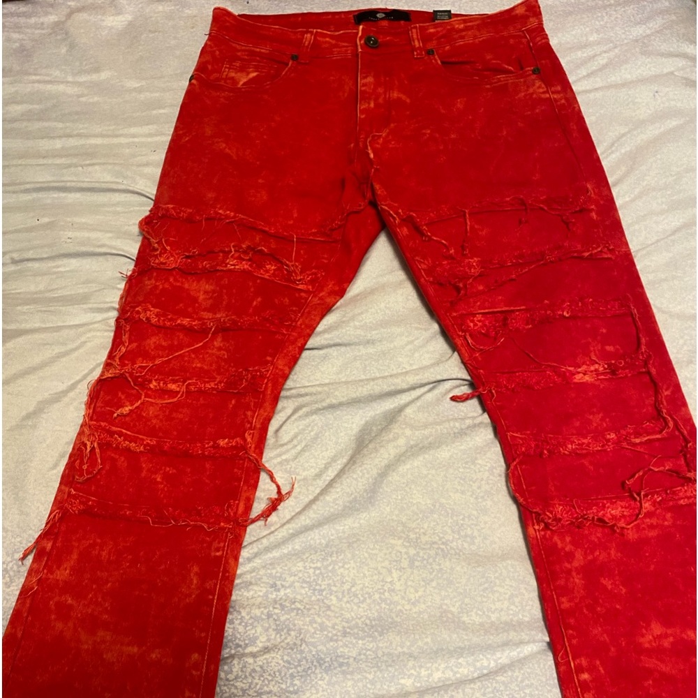 Red stacked jeans